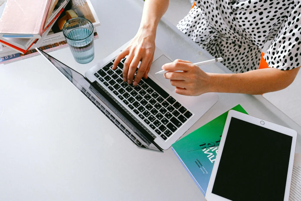 a small business owner planning their branding archetype on their laptop